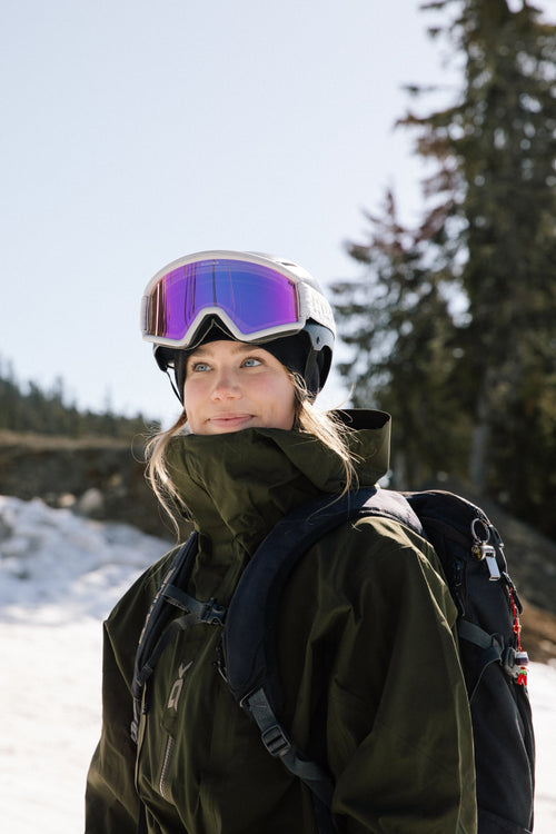Girl outside with ski goggles